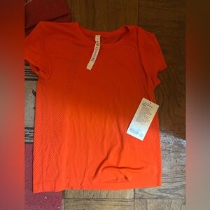 Lululemon Train to Be Short Sleeve Orange NWT sz 6